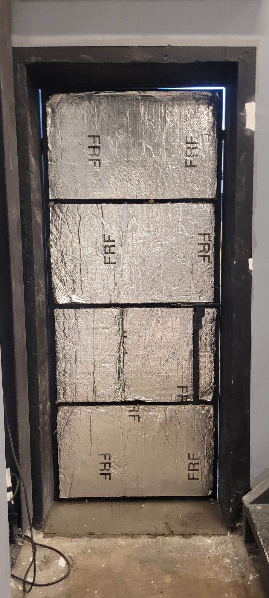 Fire-rated insulation panel installation